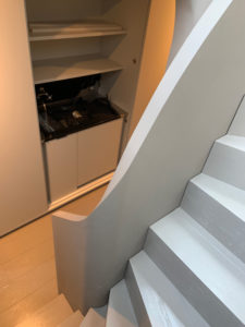 minimal white curved staircase