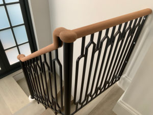 wooden staircase with short bannister