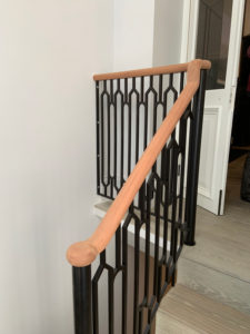 wooden staircase with short bannister