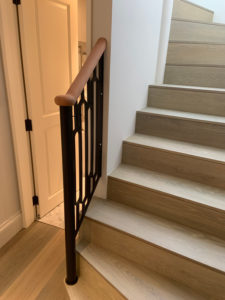 wooden staircase with short bannister