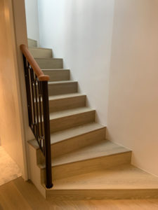 wooden staircase with short bannister