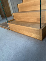 floating open wooden staircase