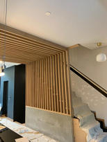 floating open wooden staircase with wood planks