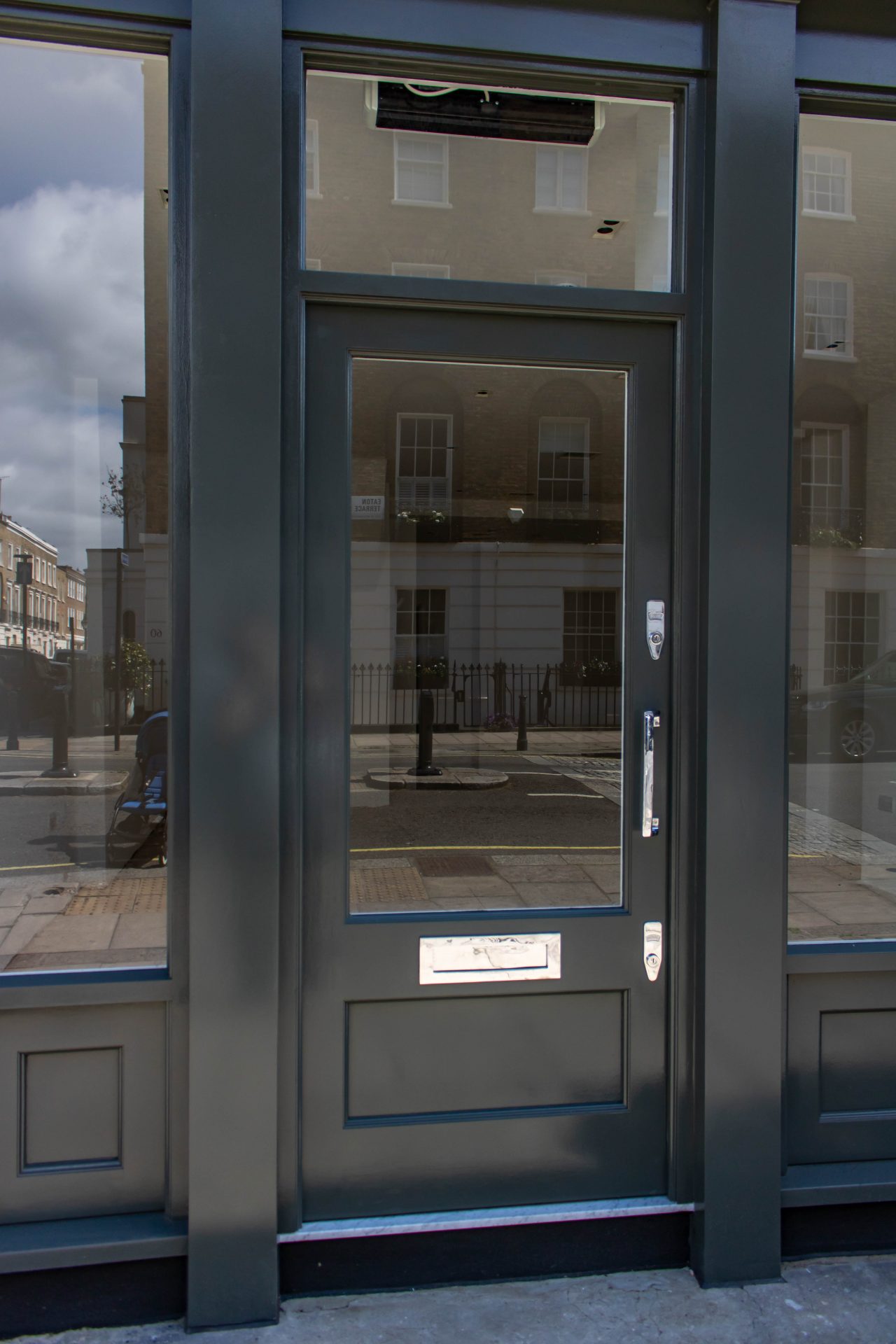 Shopfront, door and sash window, Eaton Terrace, London