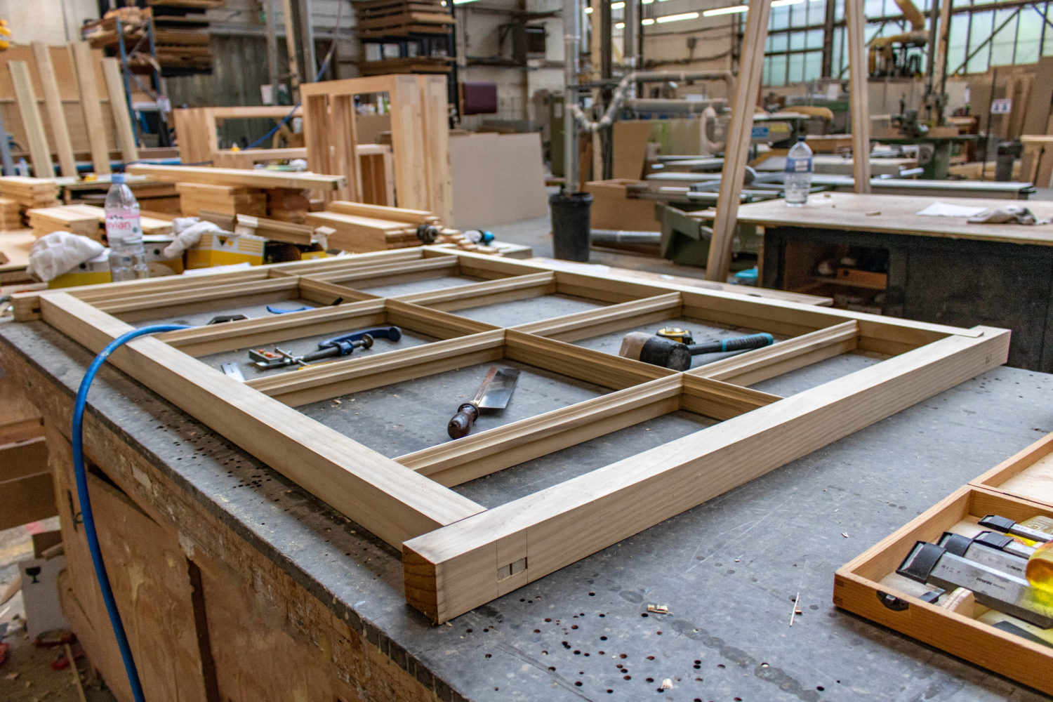 Wood window frame construction in joinery workshop