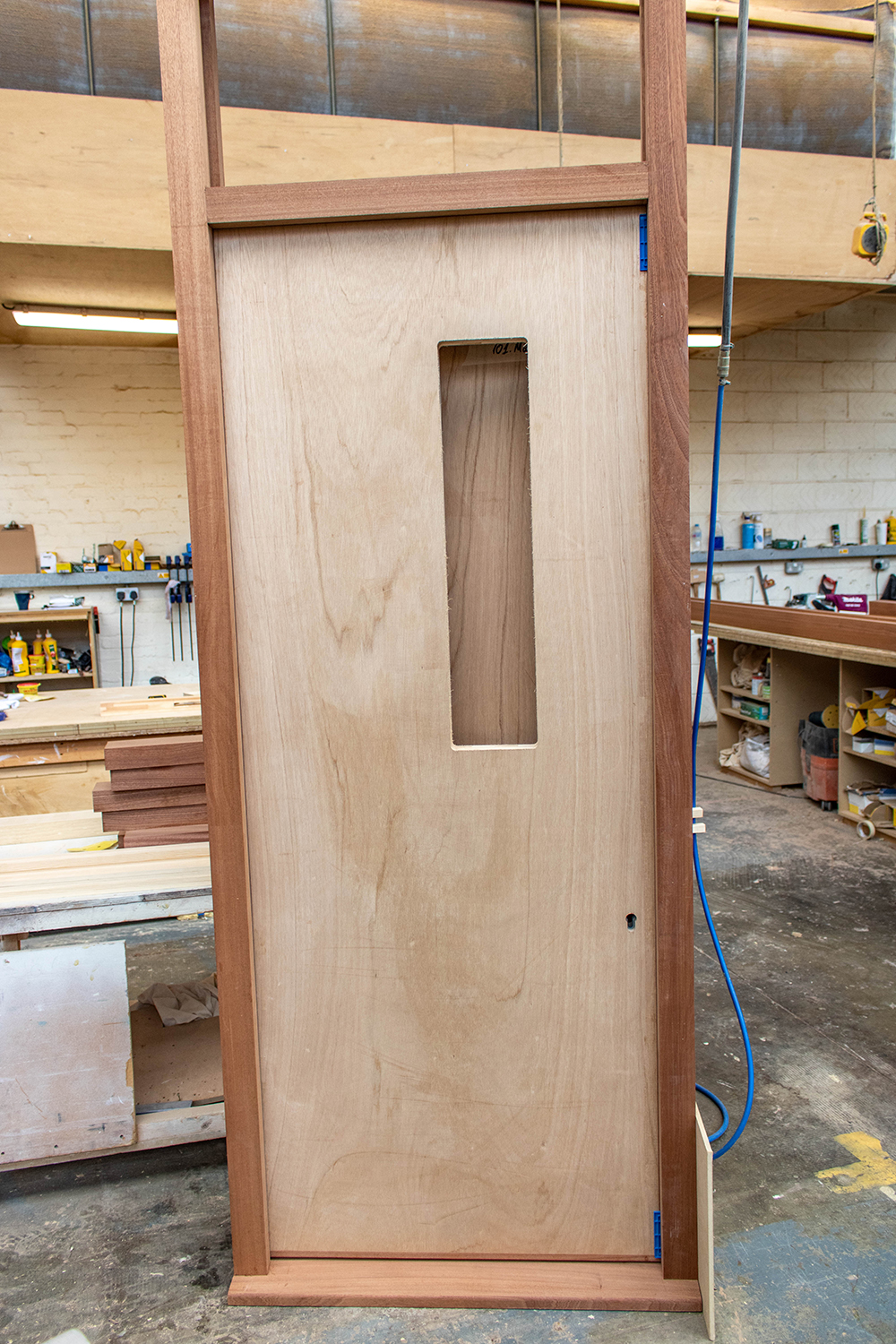 Wood door with small window slit