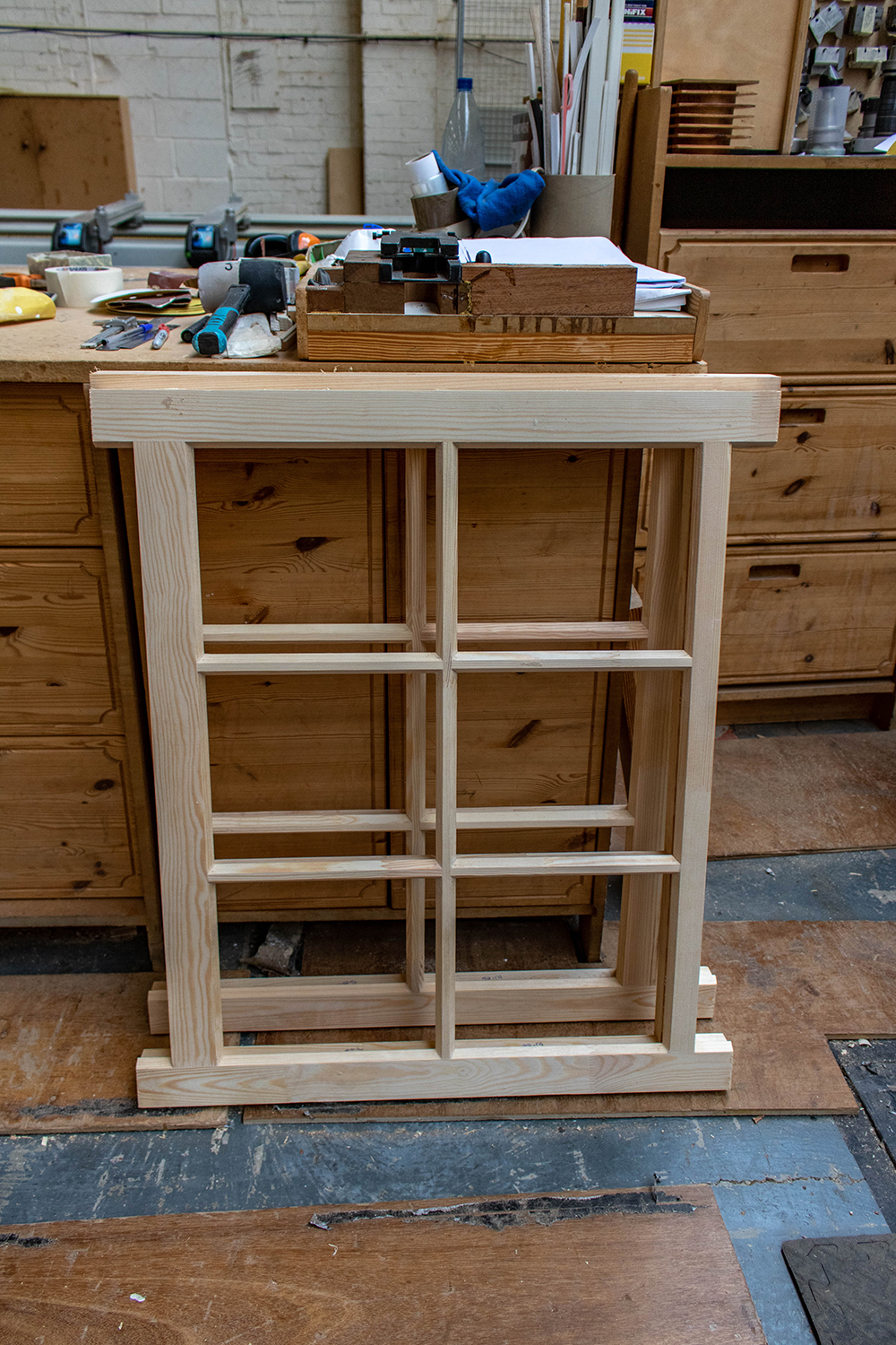 Set of 2 window frames in joinery workshop