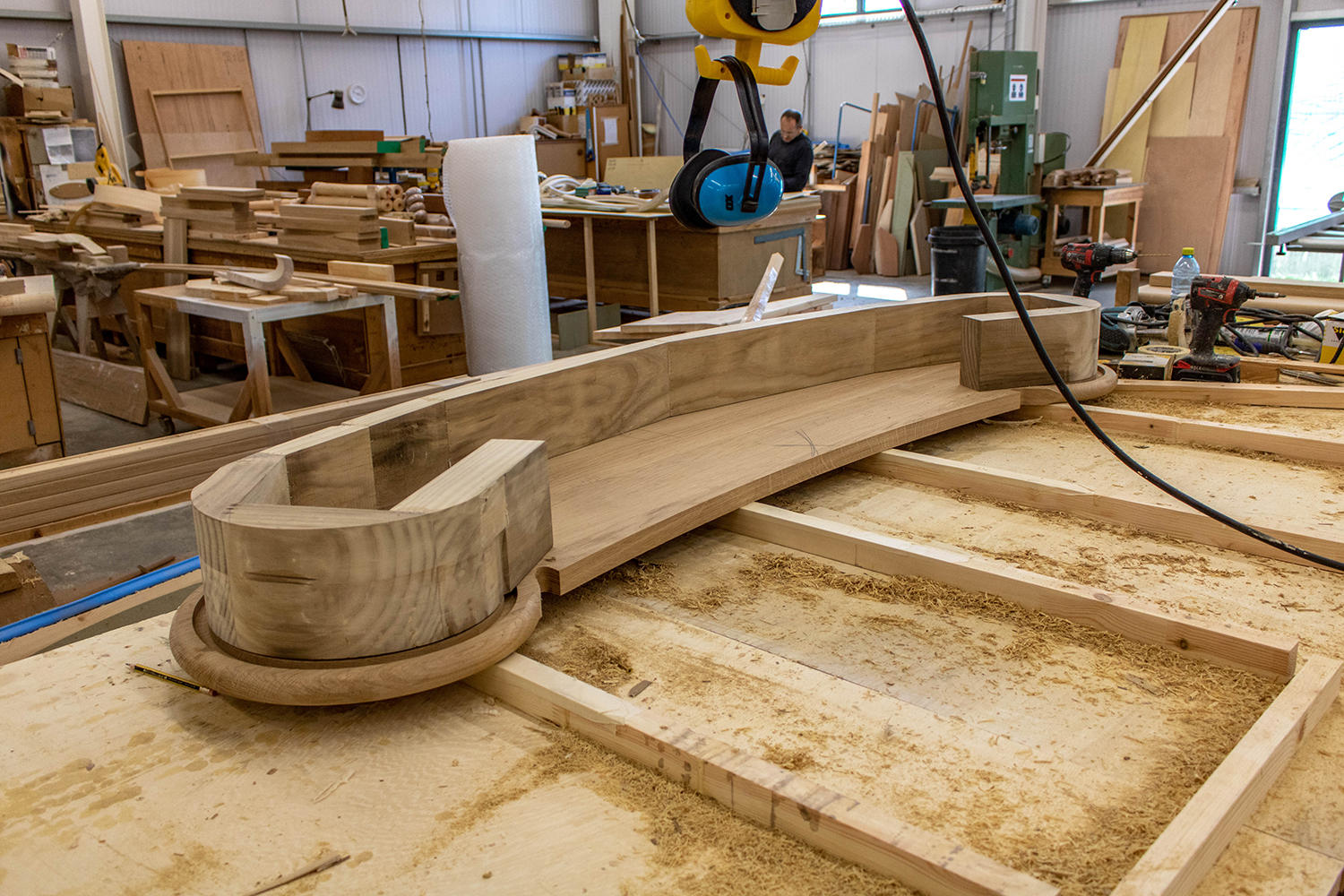 Bespoke curved structure in joinery workshop