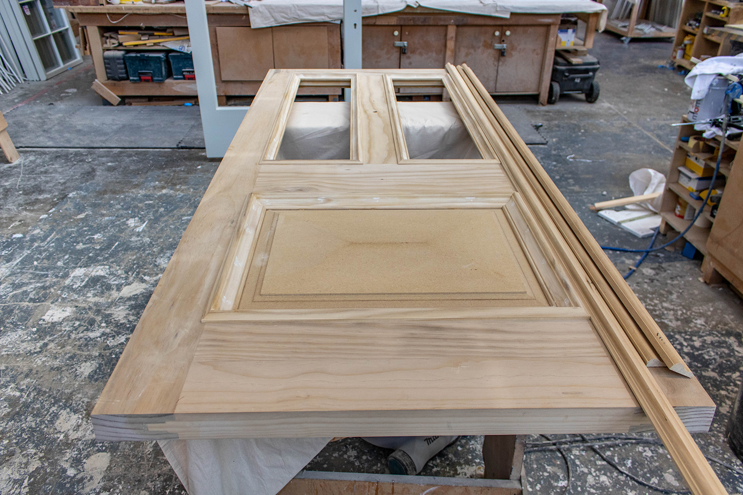 bespoke wood door construction in joinery workshop