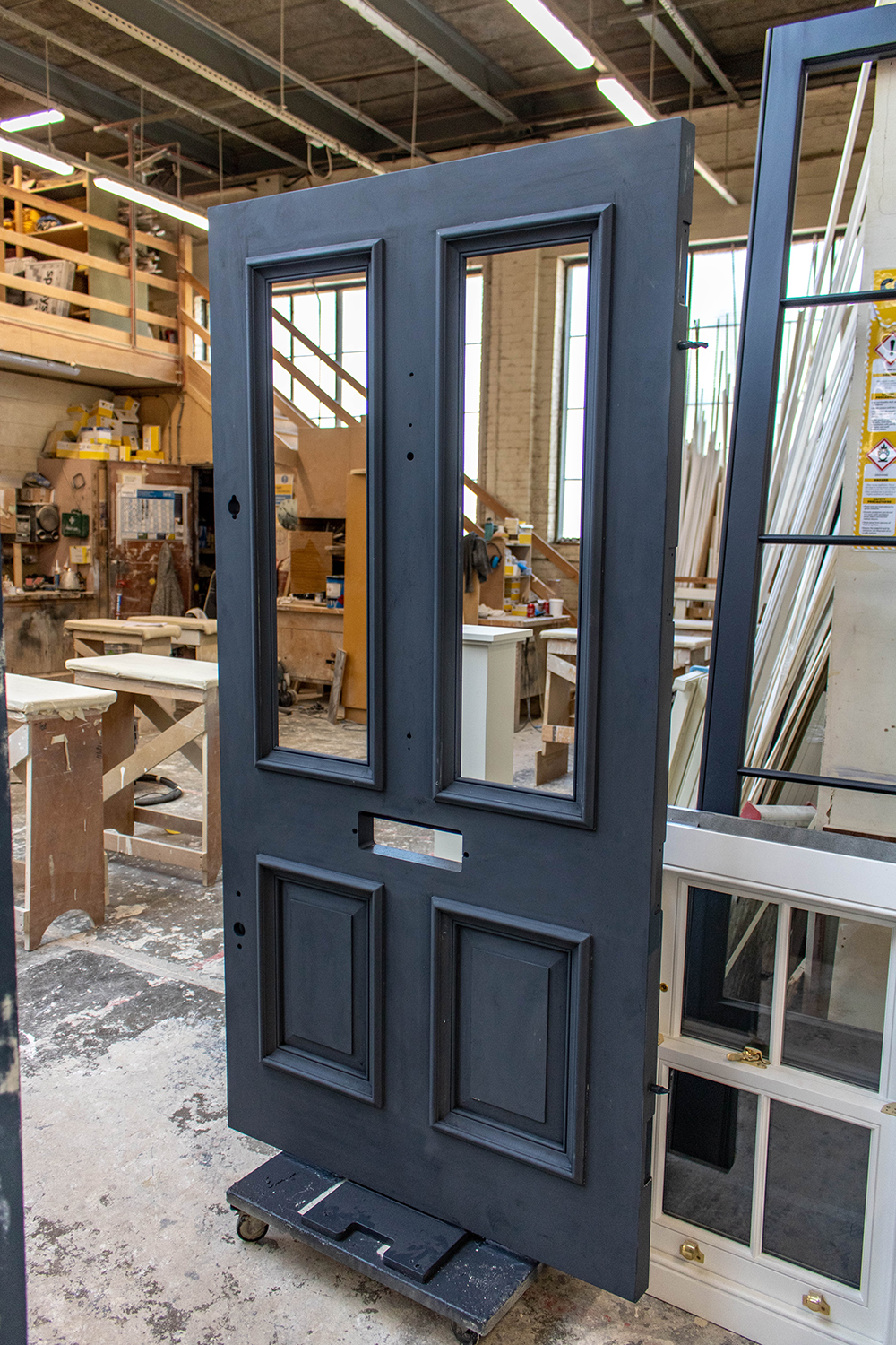 grey door construction in joinery workshop