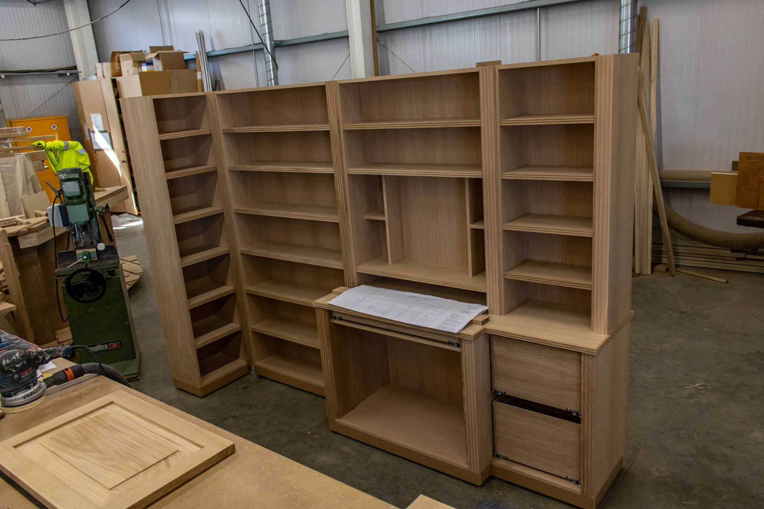 wooden set of shelves and cabinetry in workshop